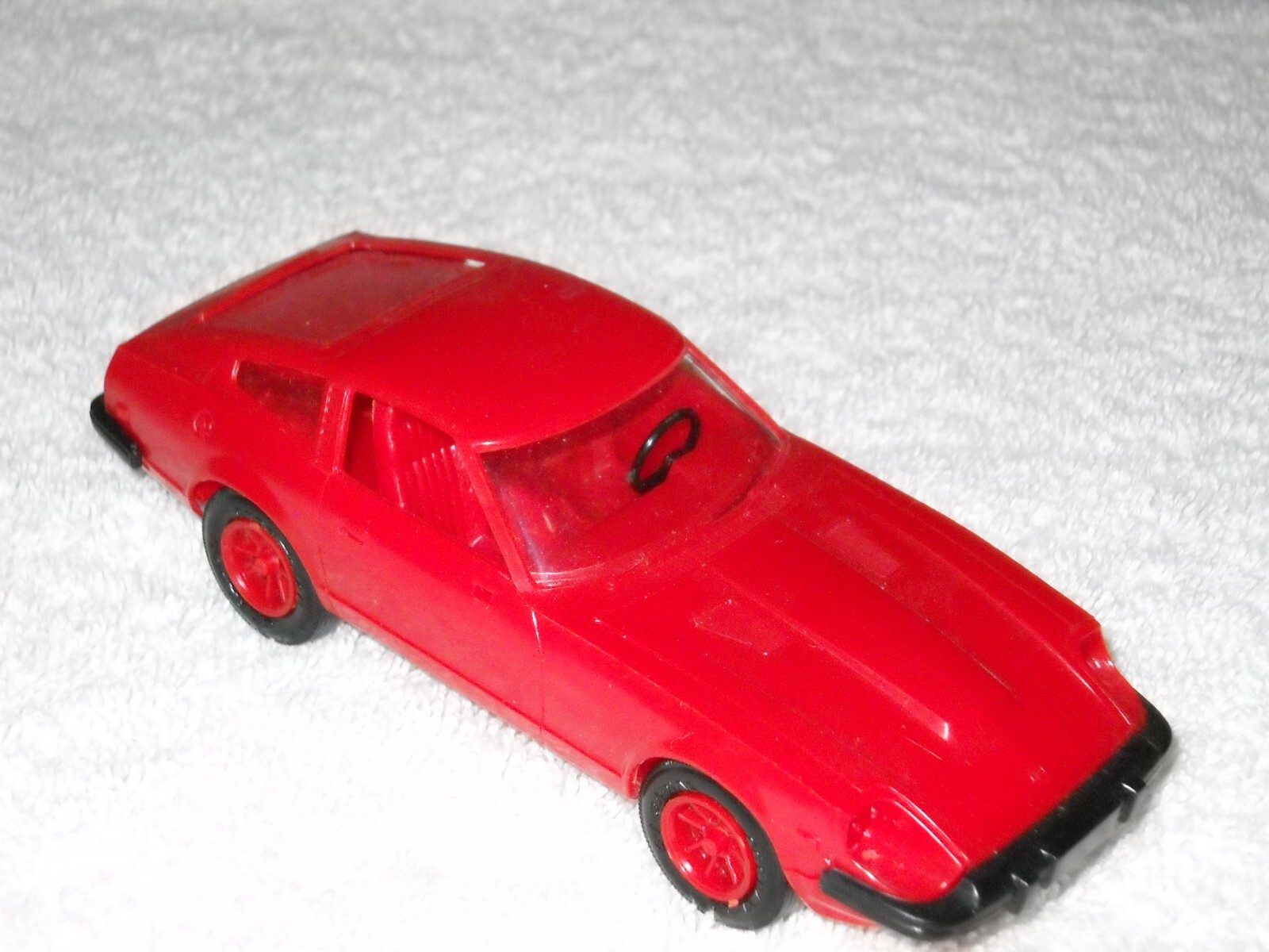 MMI Plastic 1980 Red Car, Nissan, Good Condition, Please see the photos