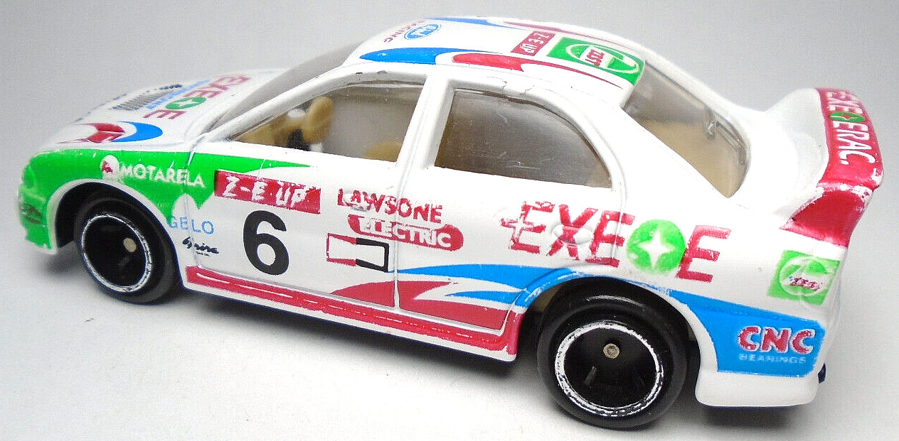 EXEOE WONROW MOTARELA #6 WHITE 1:64 DIECAST 3″ RACE CAR W GREEN RED & BLUE CHINA