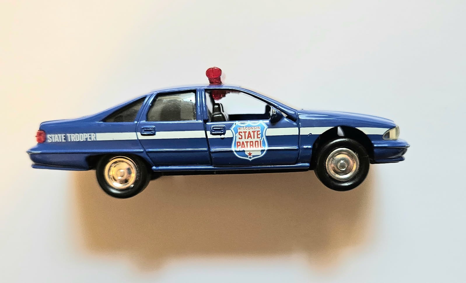 Road Champs Wisconsin State Patrol die-cast and plastic Caprice toy – 1/43 scale