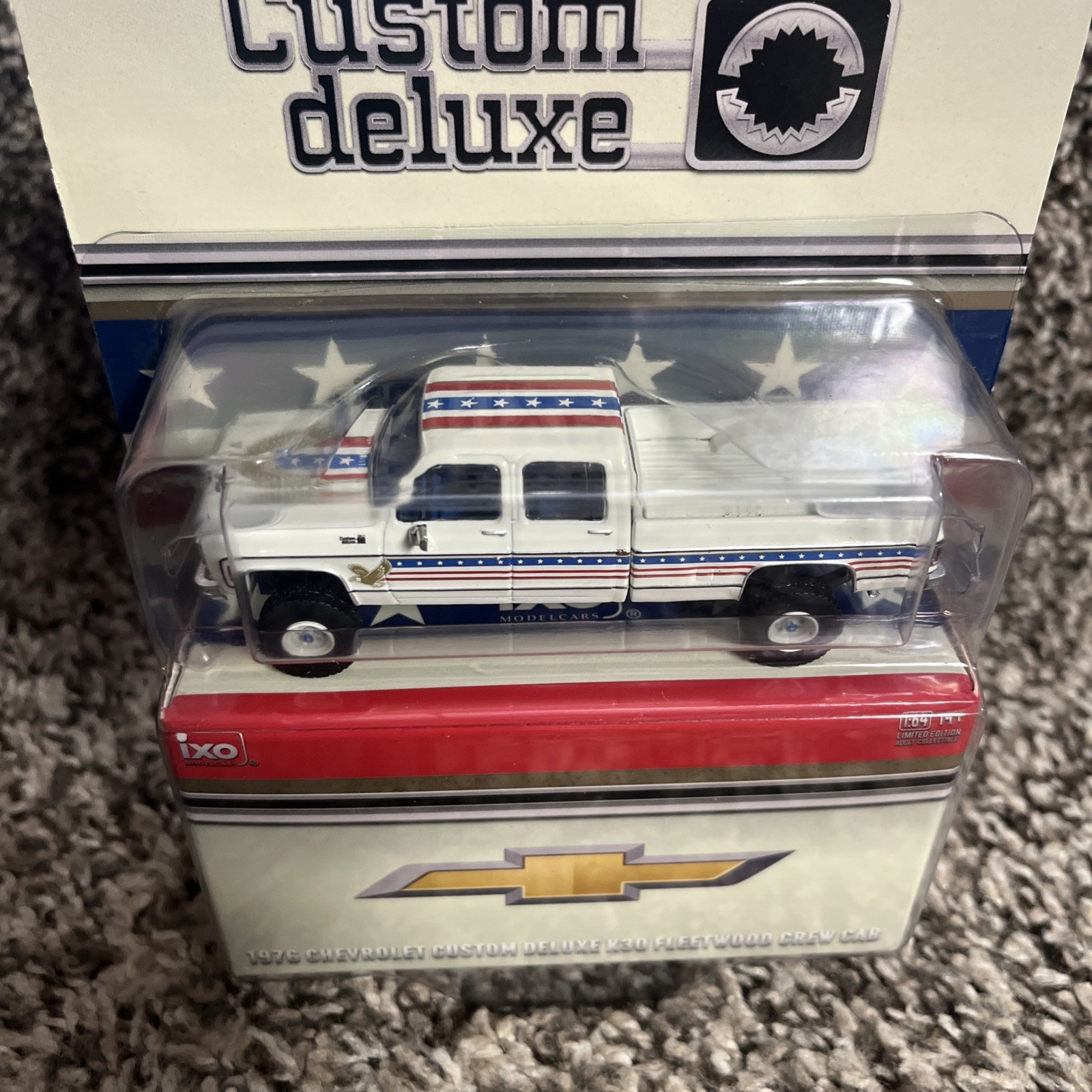 1:64 IXO 1976 Chevrolet Custom Deluxe K30 Fleetside Crew Cab- July 4th Exclusive