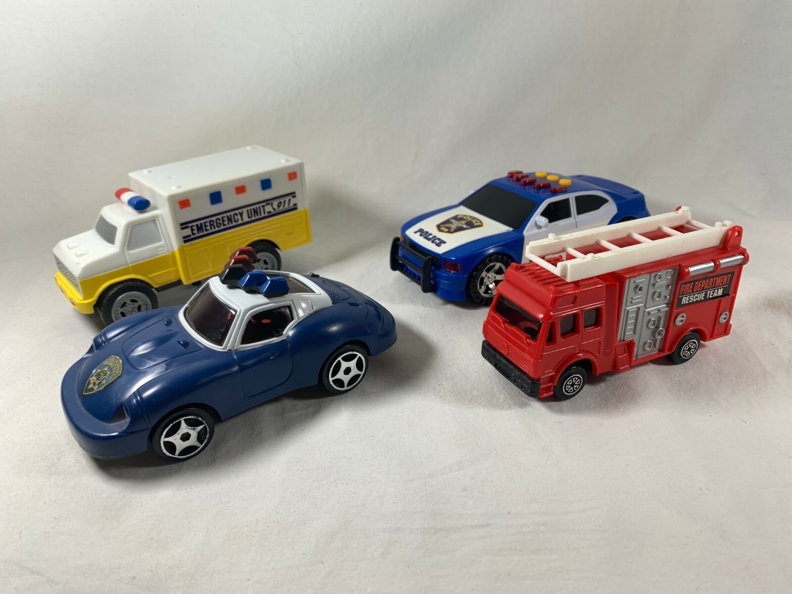 Lot of 4 Safety Service Toy Cars Police Fire Rescue Ambulance Emergency Response