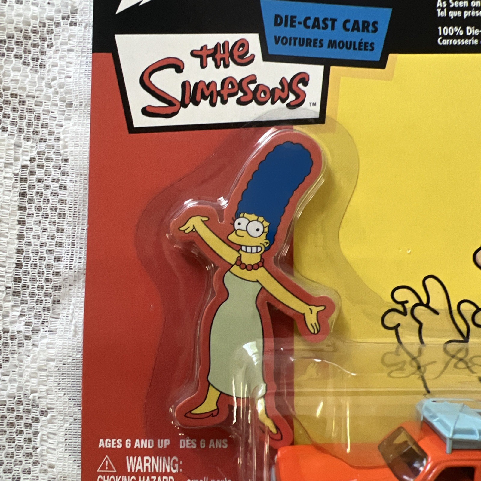 Johnny Lightning The Simpsons Marge’s Car 1:64 Diecast Orange Unopened Box