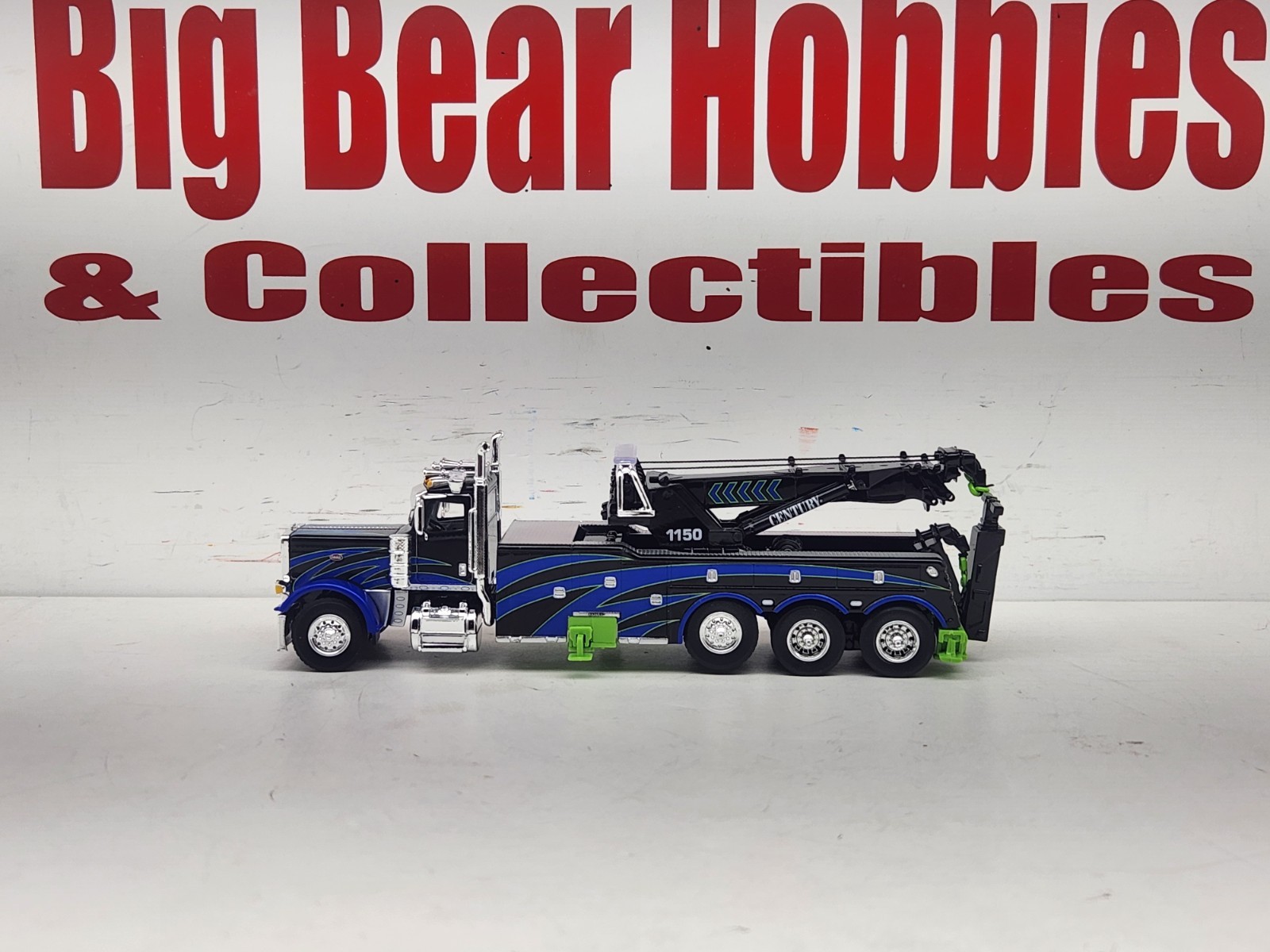 1/64 DCP/FG #60-2248 Black, Blue, & Green 389 DC Peterbilt Century 1150 Rotator