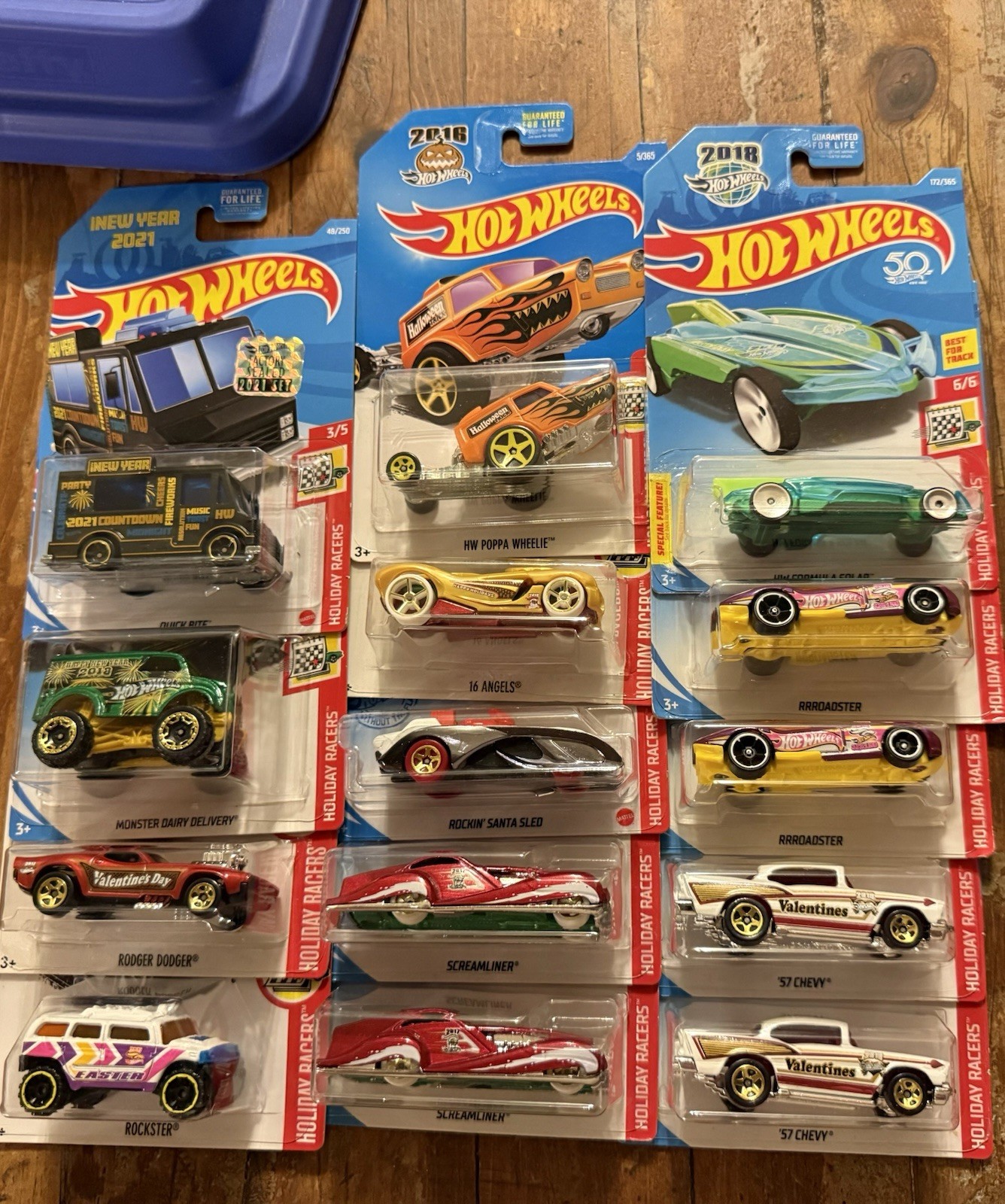 GROUP/LOT OF HOT WHEELS HOLIDAY RACERS! VARIOUS YEARS! 14 TOTAL DIE-CAST CARS!