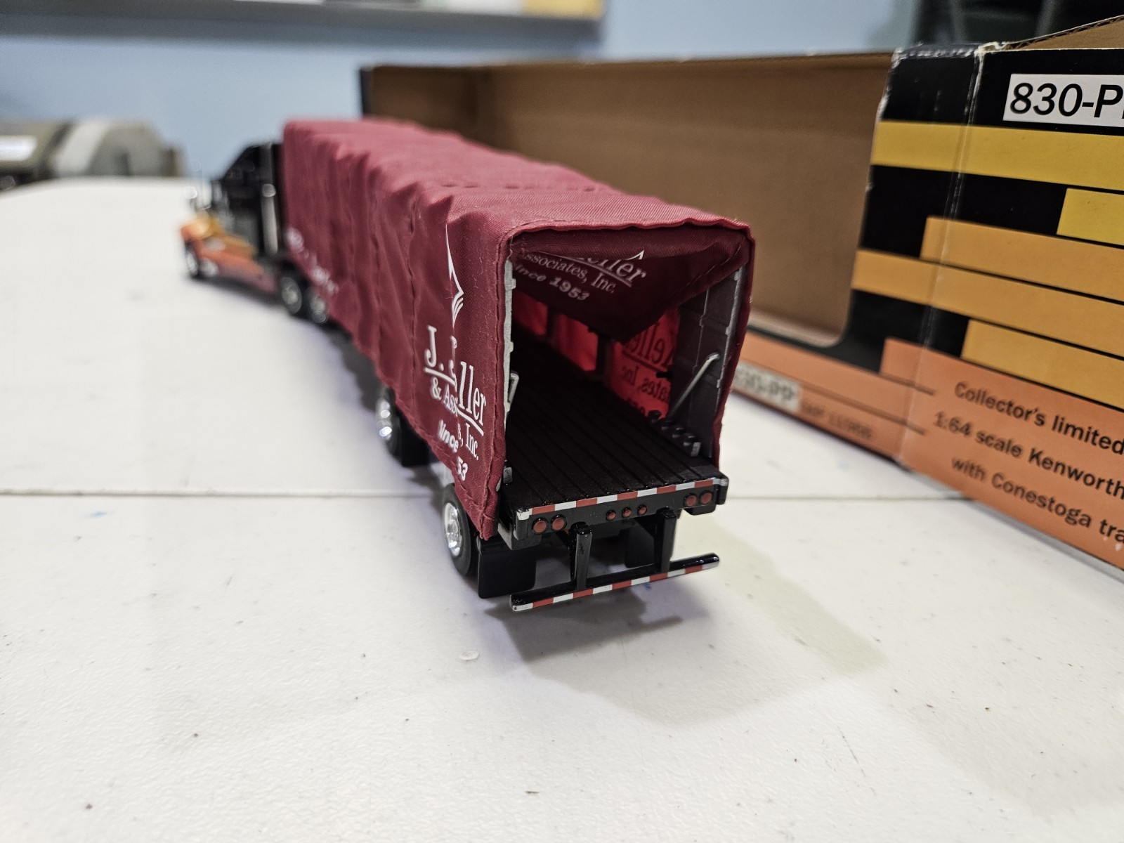 SpecCast J.J. Keller 1:64 Kenworth T-600B w/Conestoga Trailer #830-PP *Details*