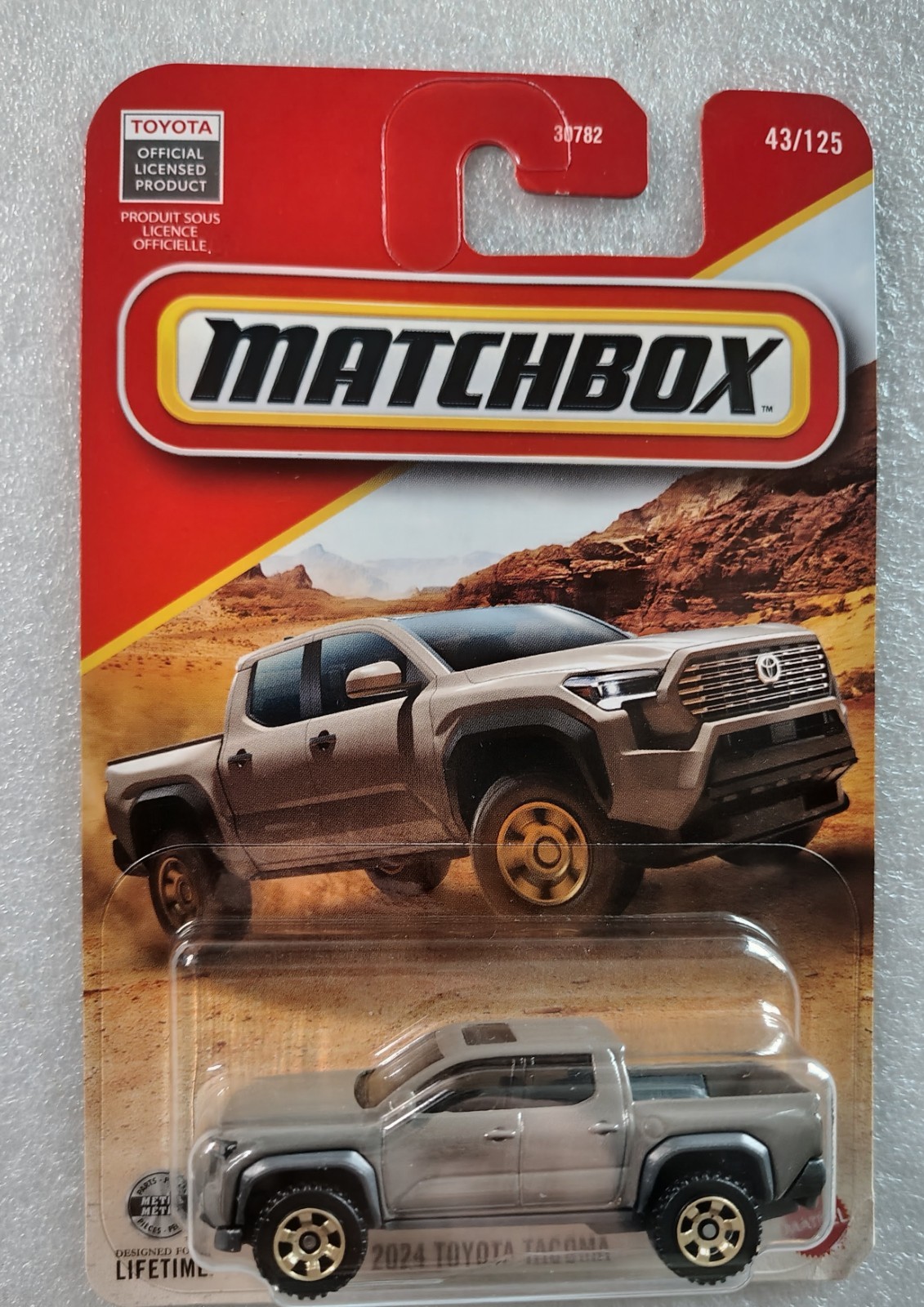 2024 Toyota Tacoma Pickup Light Brown #43/125 Matchbox ’26 diecast licensed card