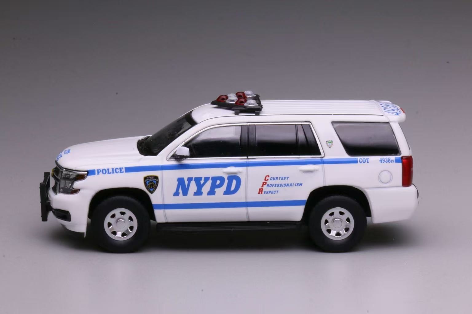 596 1: 64 Chevrolet Tahoe New York Police Car Diecast Collect Car