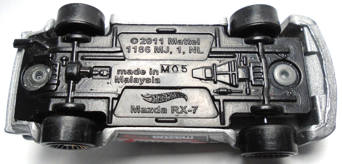 2011 HOT WHEELS MAZDA RX-7 KONI SILVER 2 5/8″ DIECAST RACE CAR WITH BLACK & RED