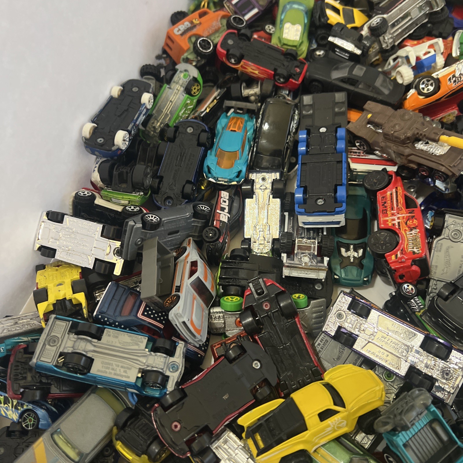 30 LBS Pounds of pure hotwheels. There are many different years and castings.