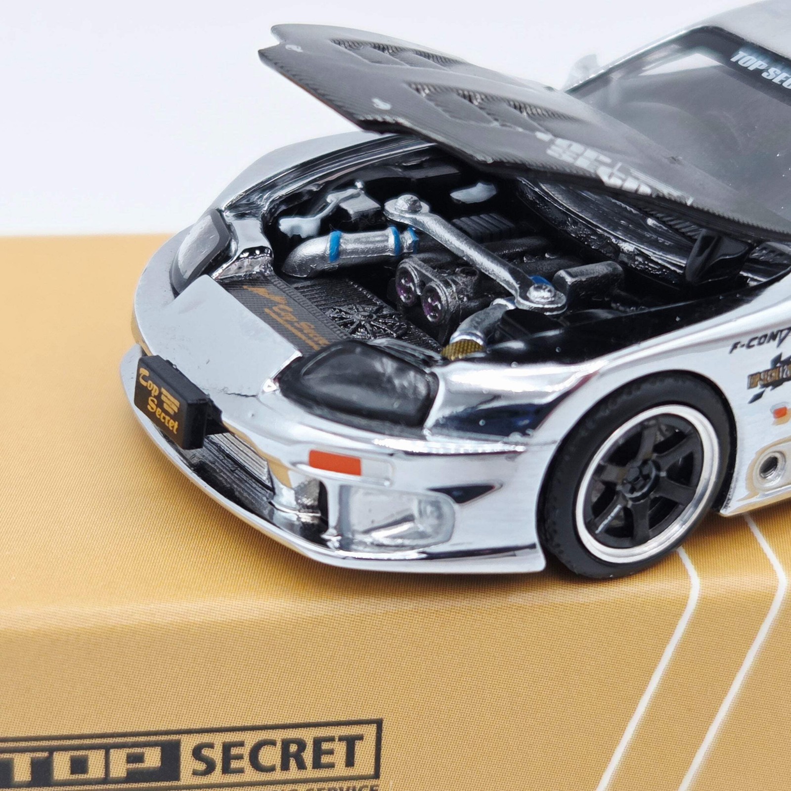 Pop Race Top Secret Toyota GT300 Supra – 1:64, Silver Chrome (2026)