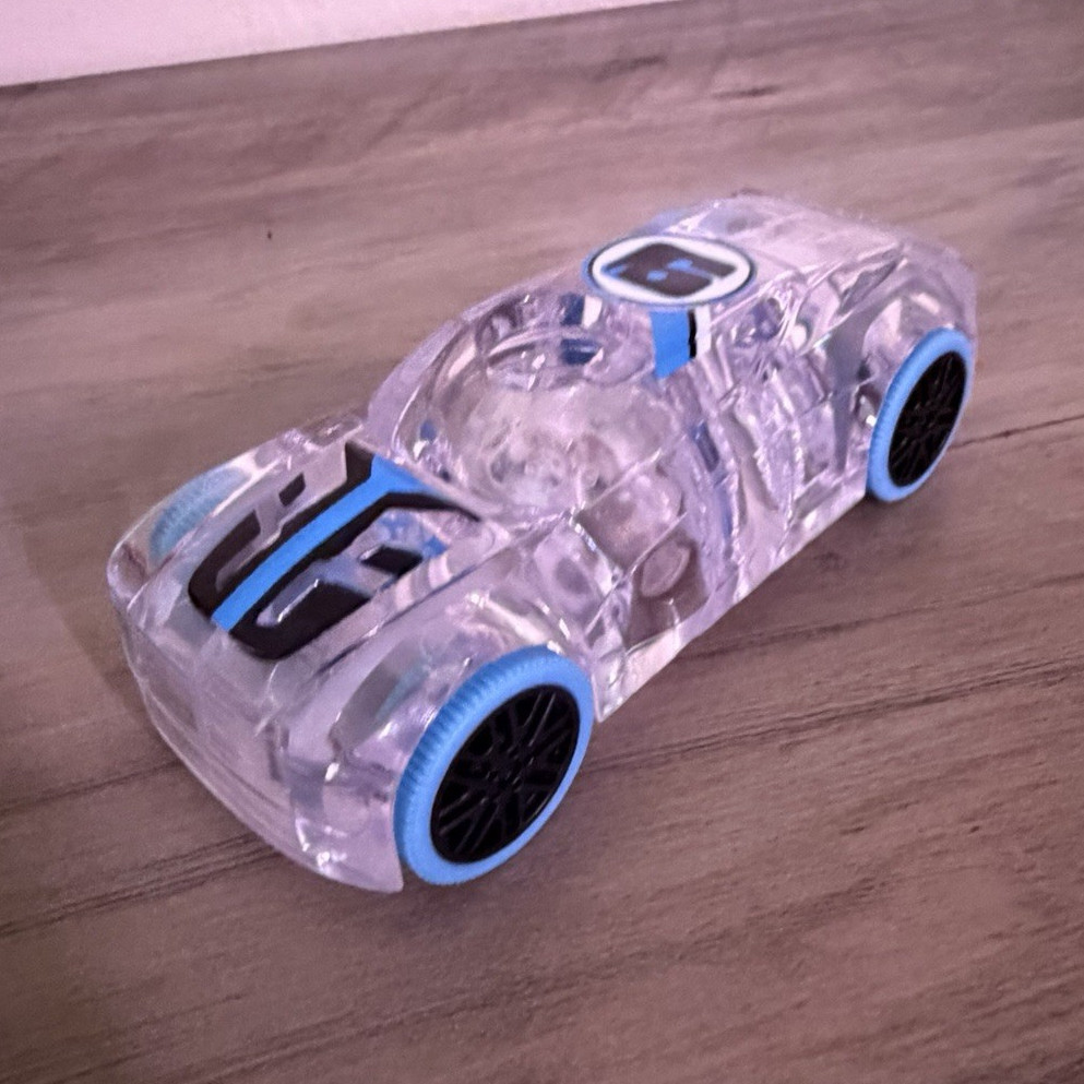 Clear Plastic Light-Up Toy Car with Blue Wheels, Ages 3+, Boys & Girls