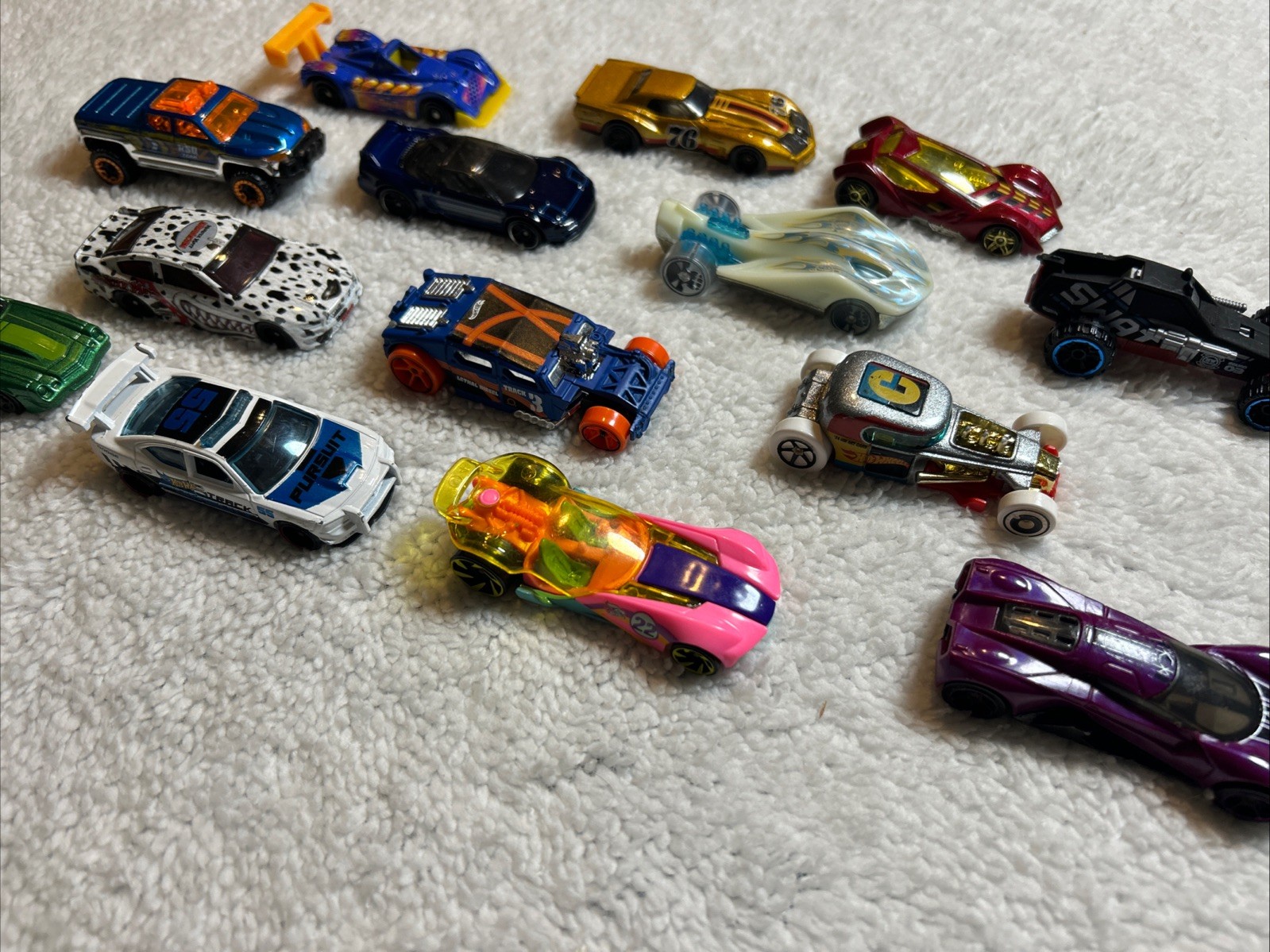 Random Lot of 14 Hot wheels die-cast cars from various years (Out of box)