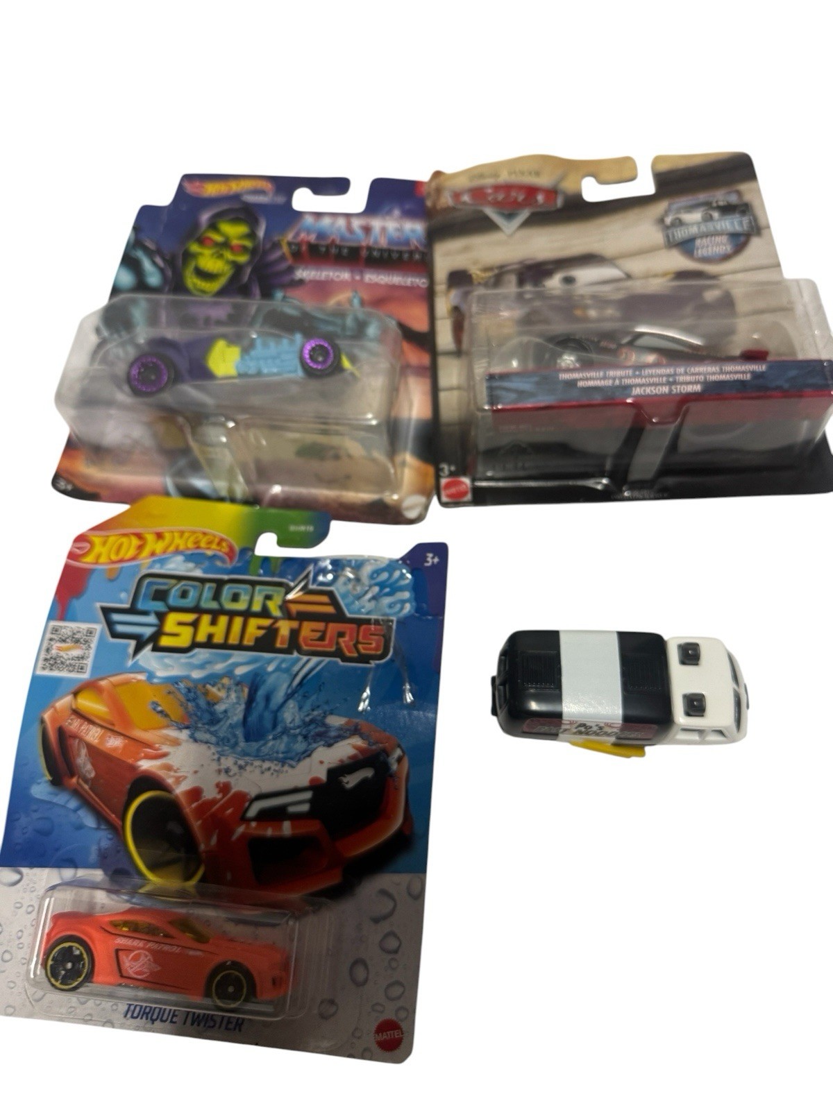 hot wheels mix lot of 4- see photos please-damaged package-new never used