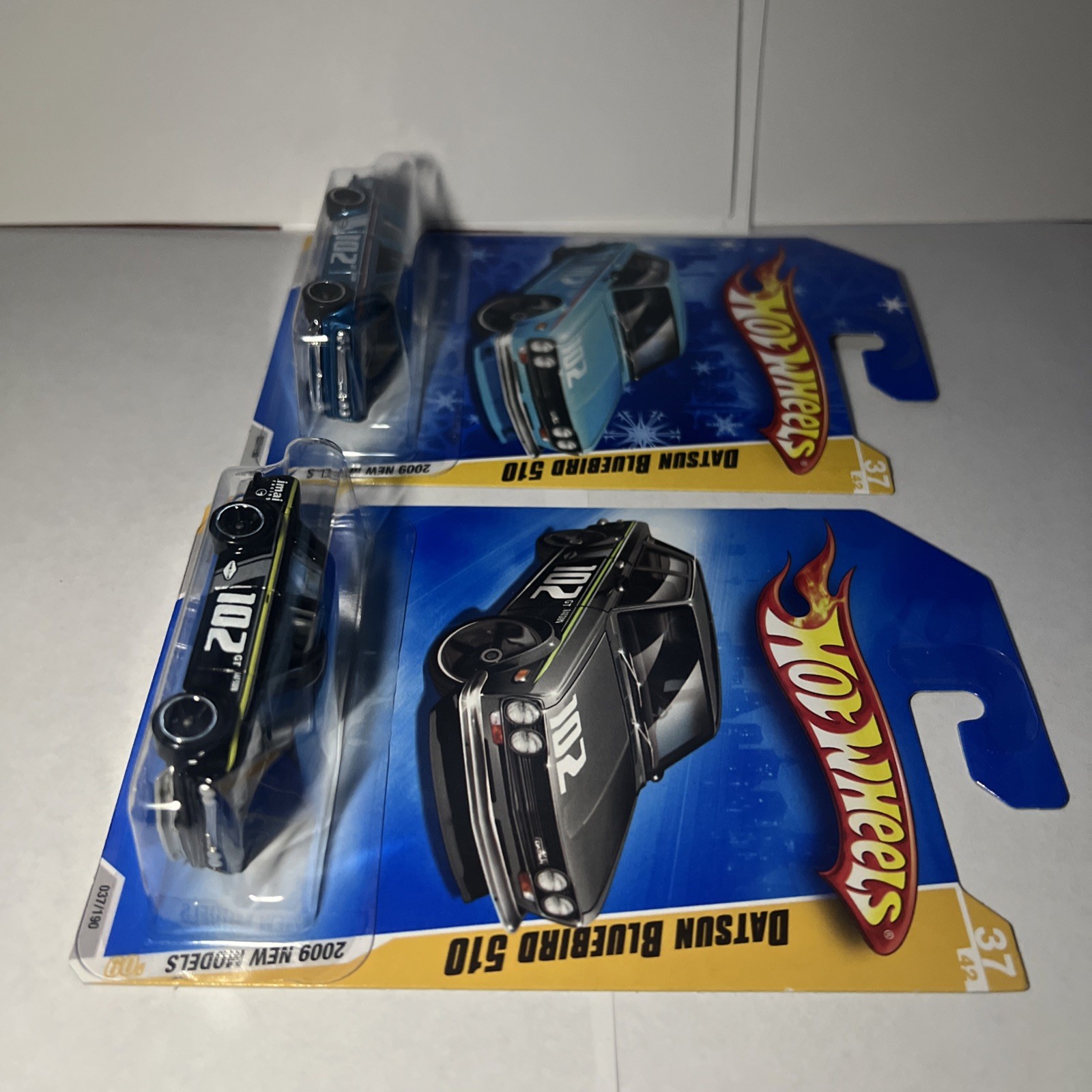 Hot Wheels 2009 Datson Bluebird 510 lot Blue + Black New Model ￼