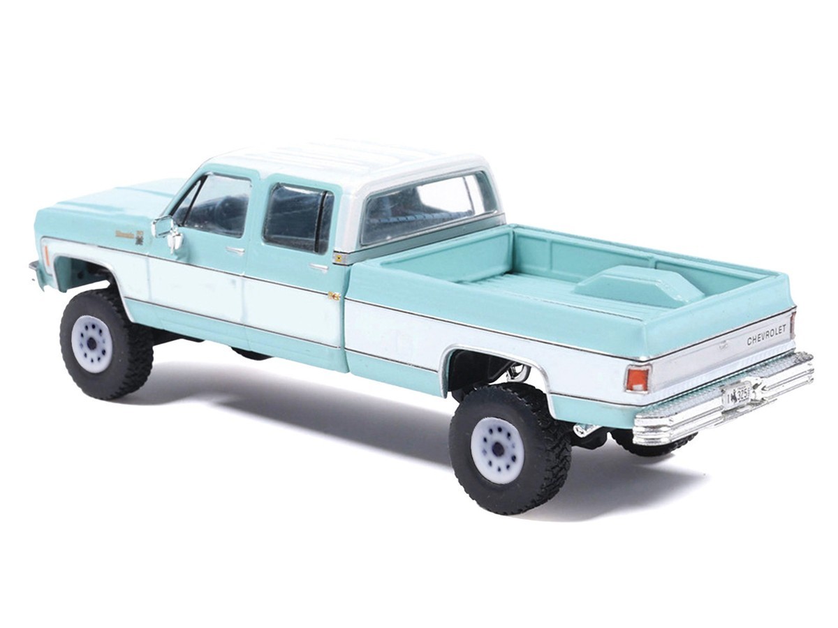 IXO Model 1:64 1978 Chevrolet Silverado K30 Crew Cab Fleetside Lifted Blue White