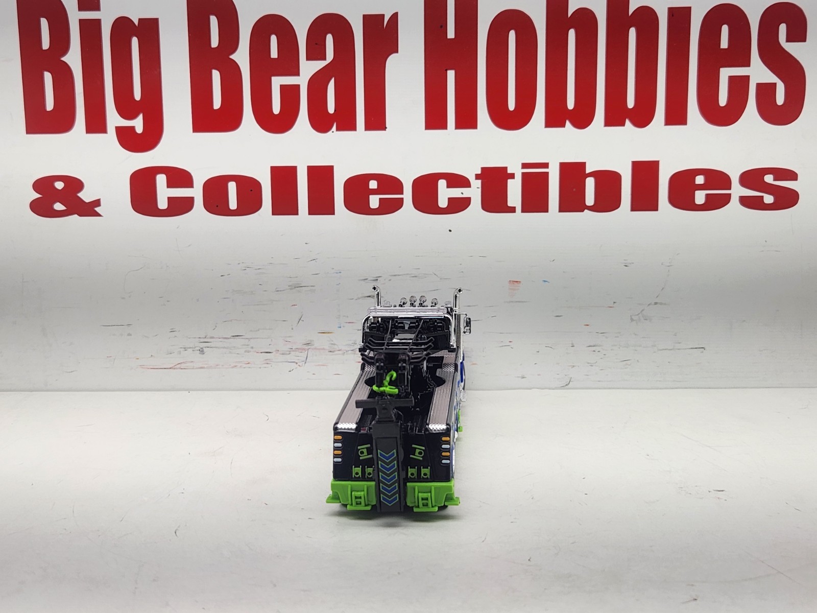 1/64 DCP/FG #60-2248 Black, Blue, & Green 389 DC Peterbilt Century 1150 Rotator