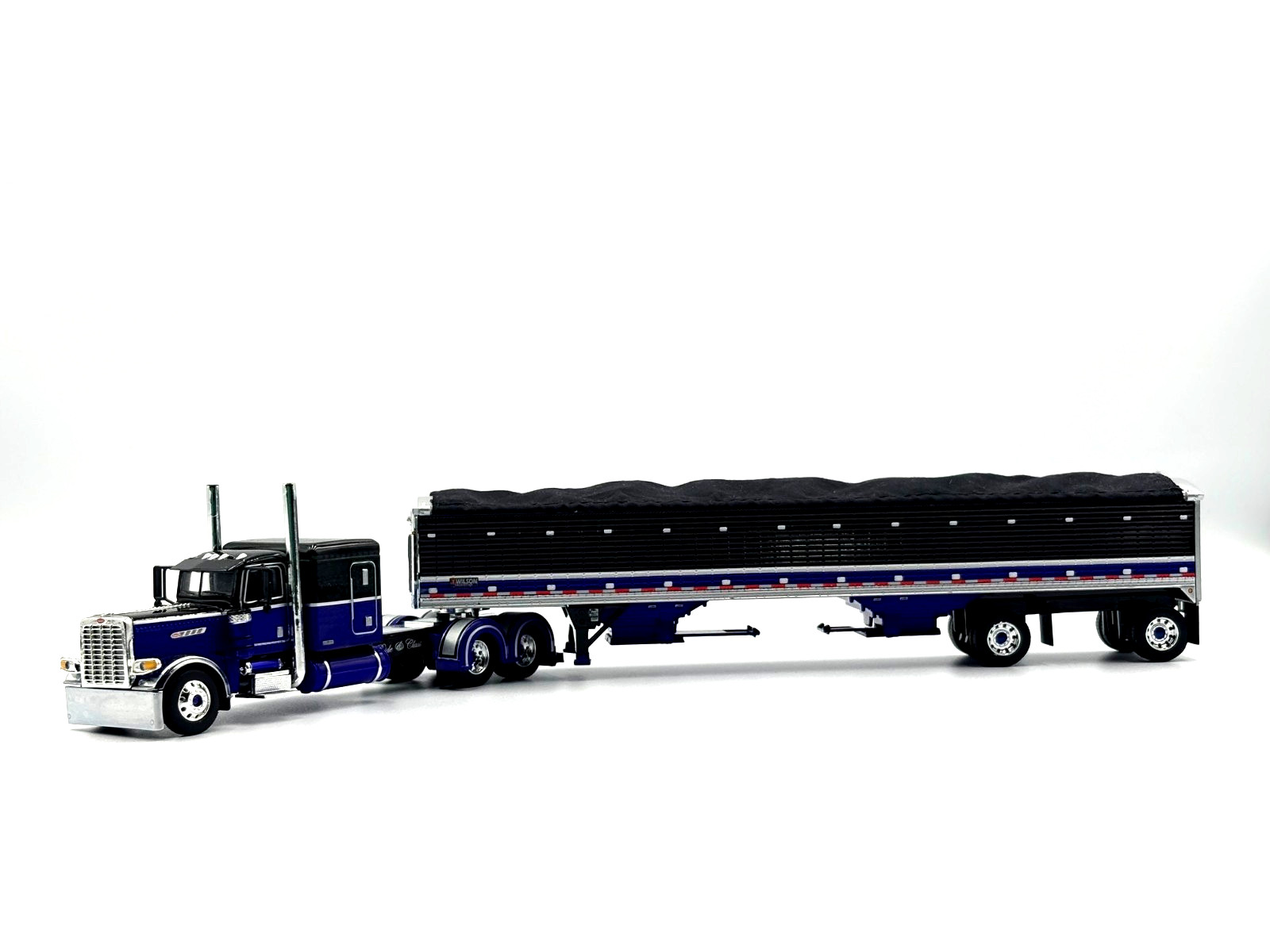 DCP 1/64 Peterbilt 389 Pride N Class Flat Top w/ Wilson Grain Trailer 60-2153