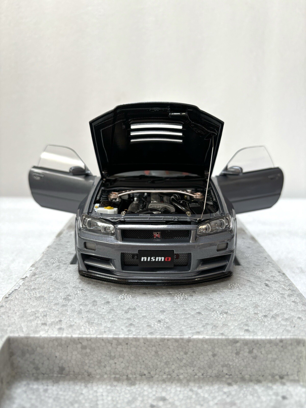 1/18 MotorHelix Nissan Skyline R34 GT-R Nismo Z-tune Gun Metallic Gray Diecast