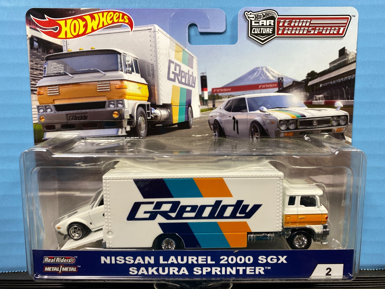 1/64 HOT WHEELS TEAM TRANSPORT GREDDY NISSAN 2000 SGX SAKURA SPRINTER REAL RIDER
