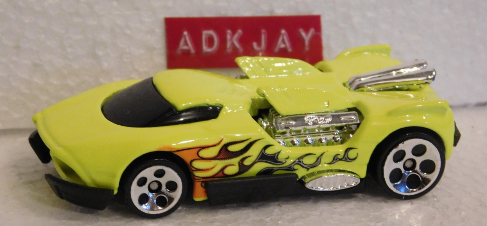 Hot Wheels ~ Maelstorm Neon Yellow Metal Body & Black Base ~ Chrome 5DOT Wheels
