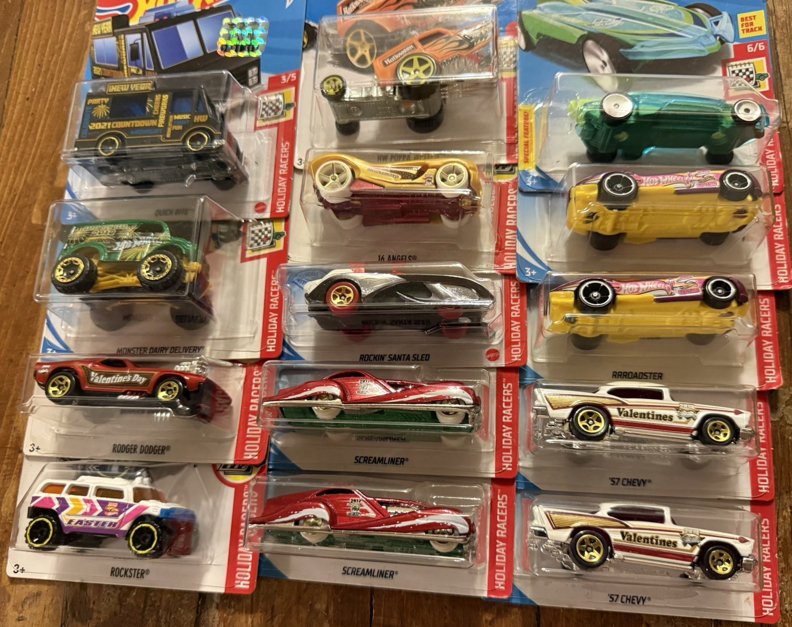 GROUP/LOT OF HOT WHEELS HOLIDAY RACERS! VARIOUS YEARS! 14 TOTAL DIE-CAST CARS!