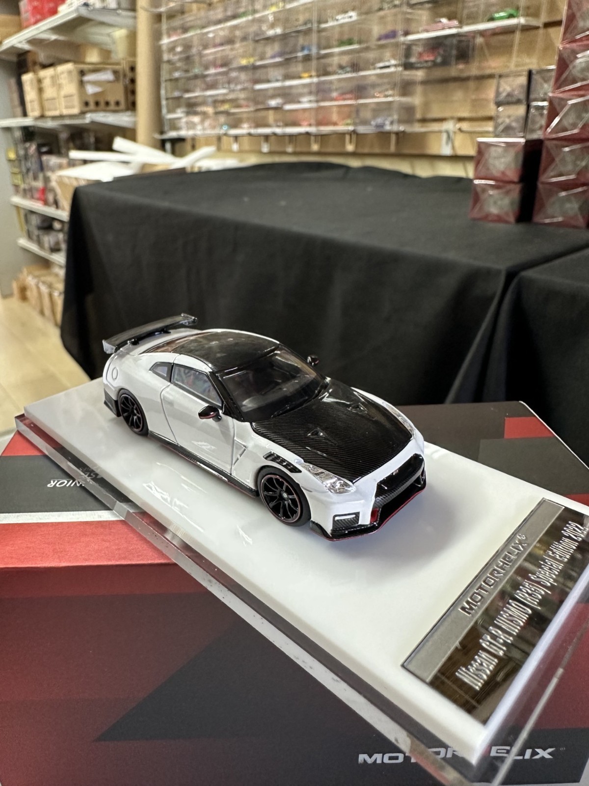 NISSAN SKYLINE GT-R R35 NISMO CARBON WHITE HOOD OPEN 1/64 CAR BY MOTORHELIX MH