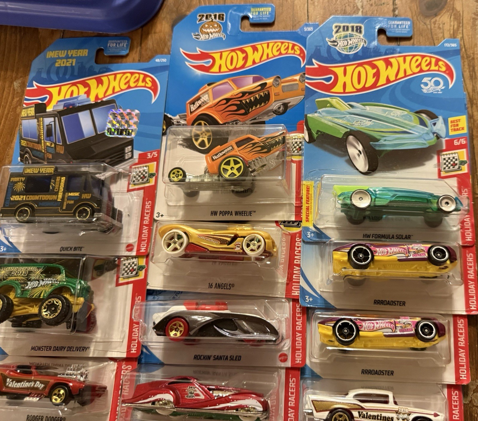 GROUP/LOT OF HOT WHEELS HOLIDAY RACERS! VARIOUS YEARS! 14 TOTAL DIE-CAST CARS!