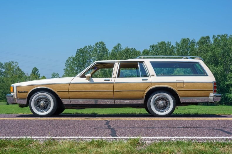 1985 Chevrolet Caprice Estate Station Wagon White/Wood in 1:18 scale by MCG