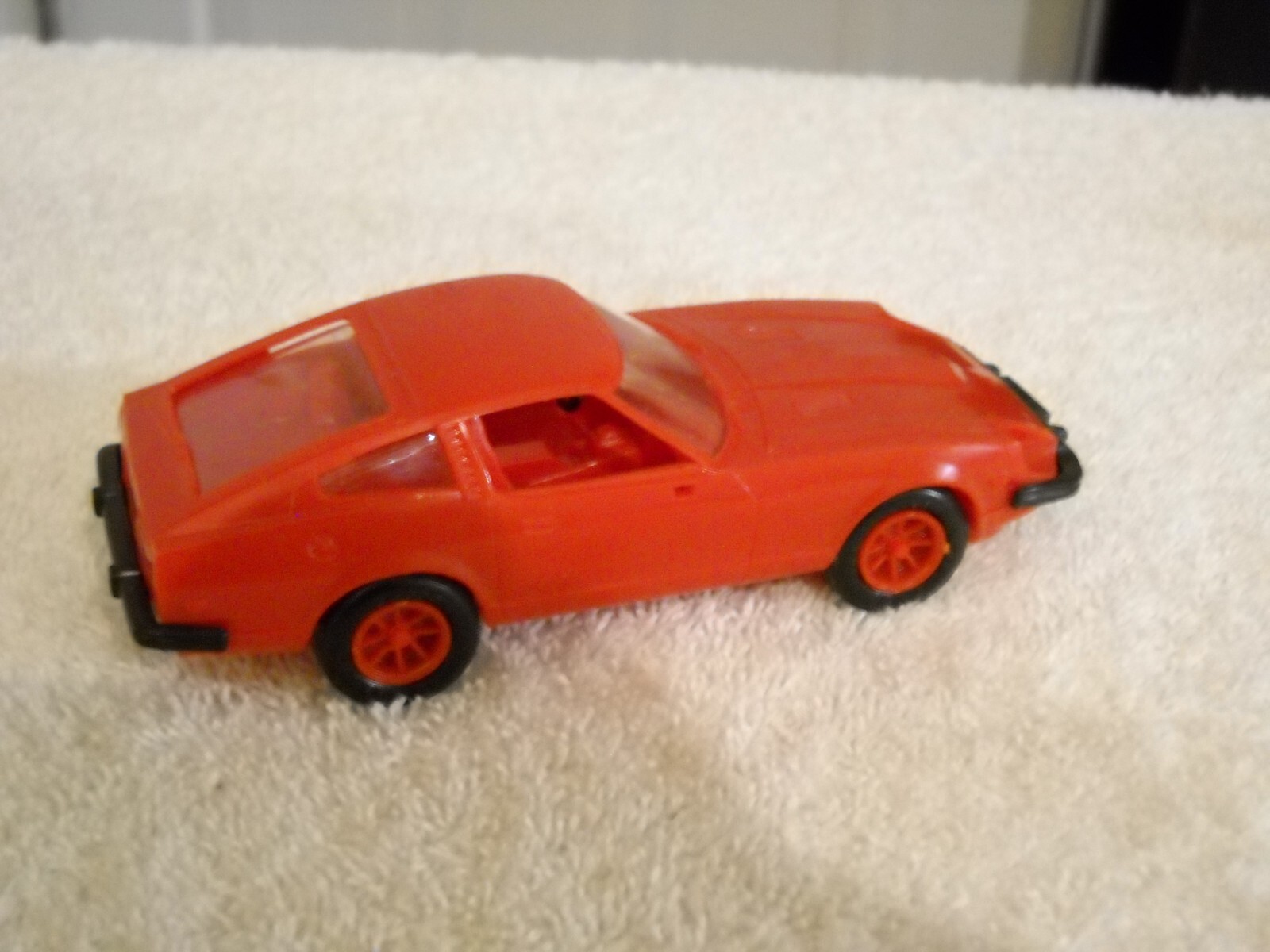 MMI Plastic 1980 Red Car, Nissan, Good Condition, Please see the photos
