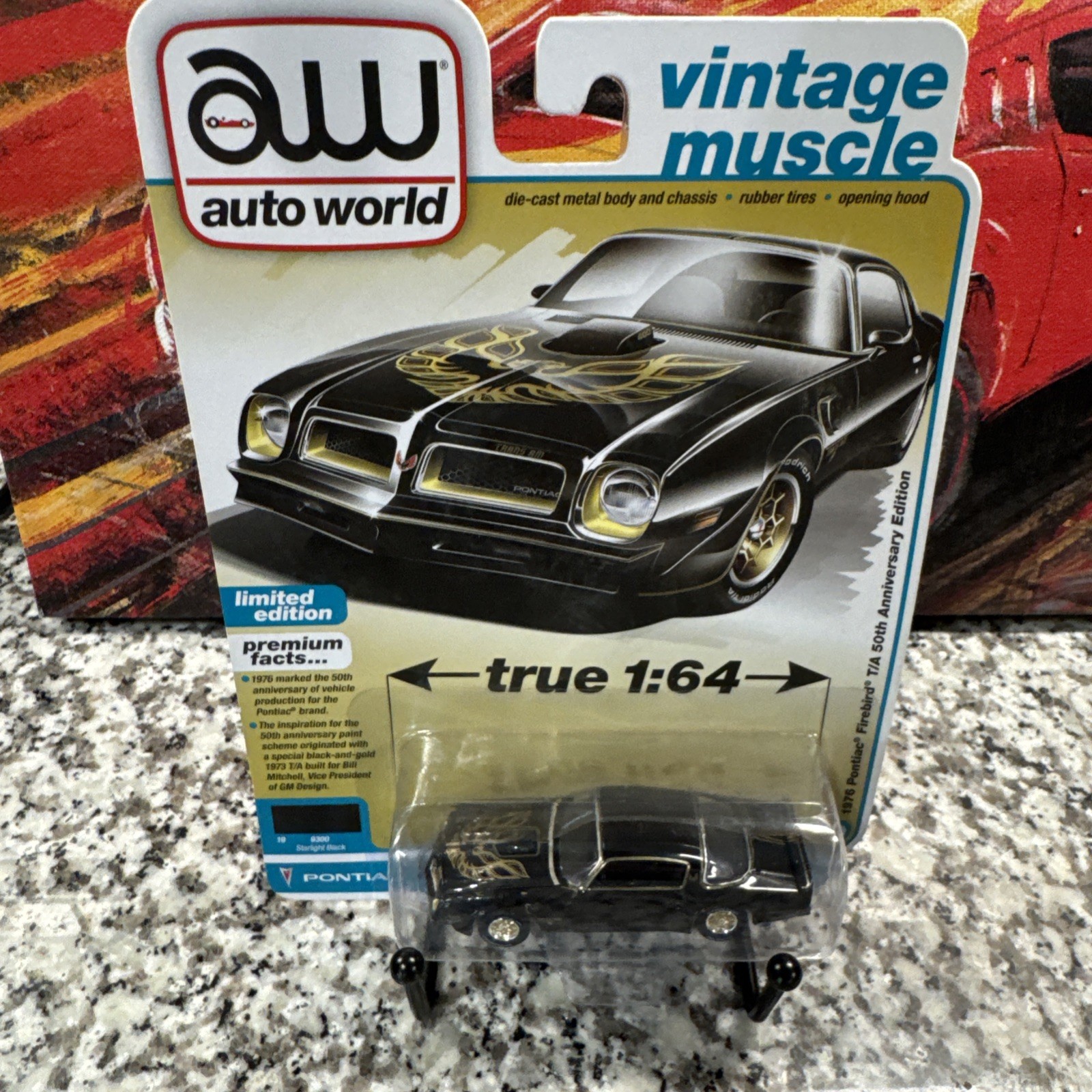 Auto World 1/64 1976 Pontiac Firebird T/A Toy Car – Gloss Black/Gold Bird…