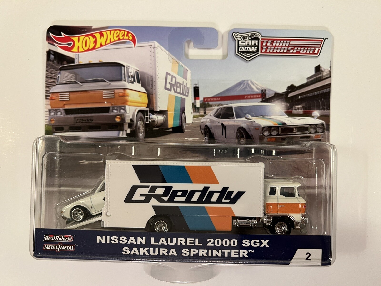 Hot Wheels Team Transporter Nissan Laurel 2000 SGX Sakura Sprinter NEW