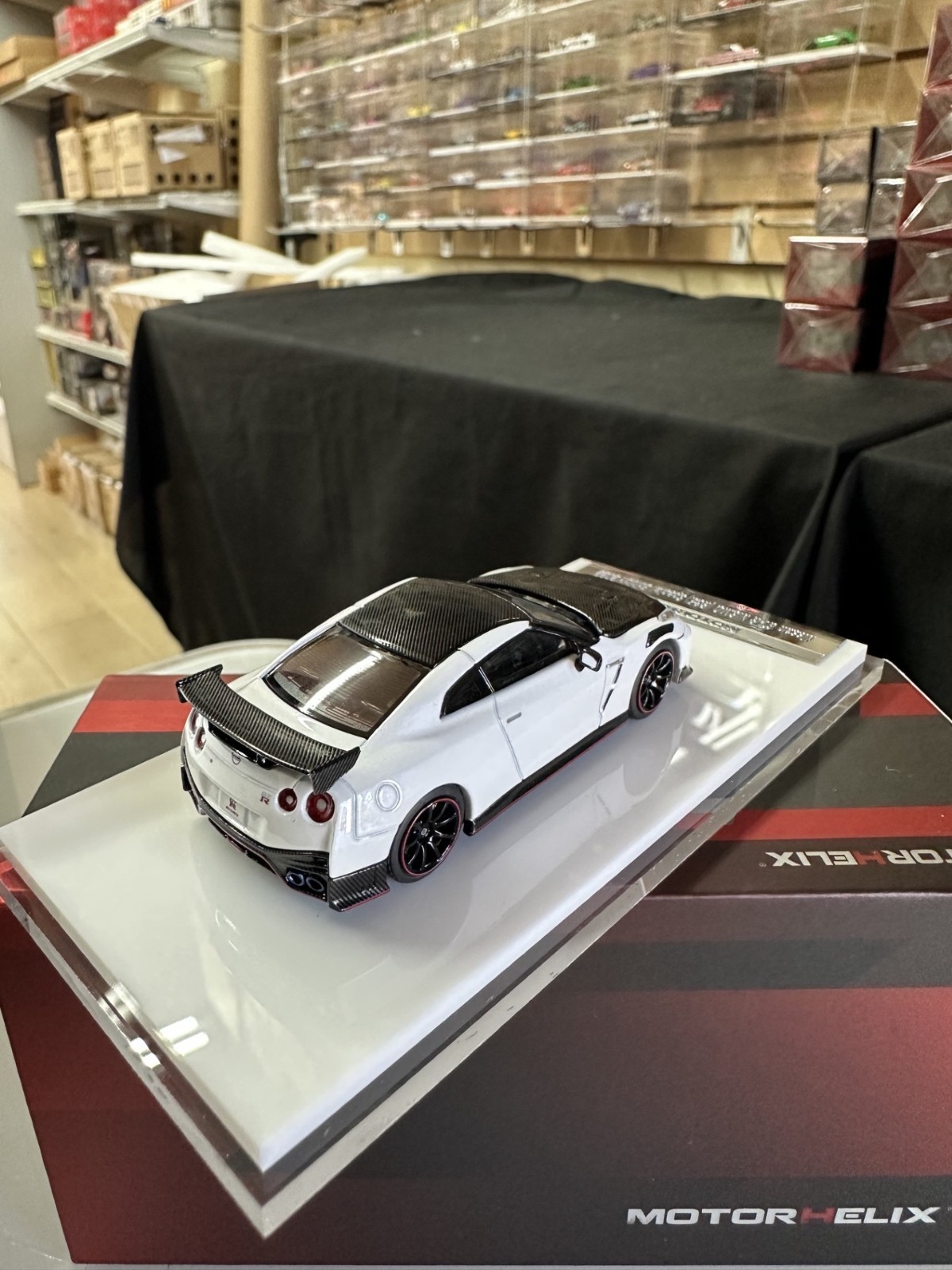 NISSAN SKYLINE GT-R R35 NISMO CARBON WHITE HOOD OPEN 1/64 CAR BY MOTORHELIX MH