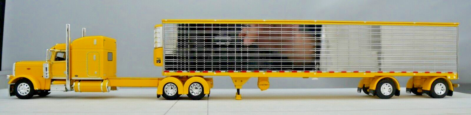 DCP 1/64 Yellow Chrome Peterbilt 389 Utility Refrigerated Trailer 60-1733
