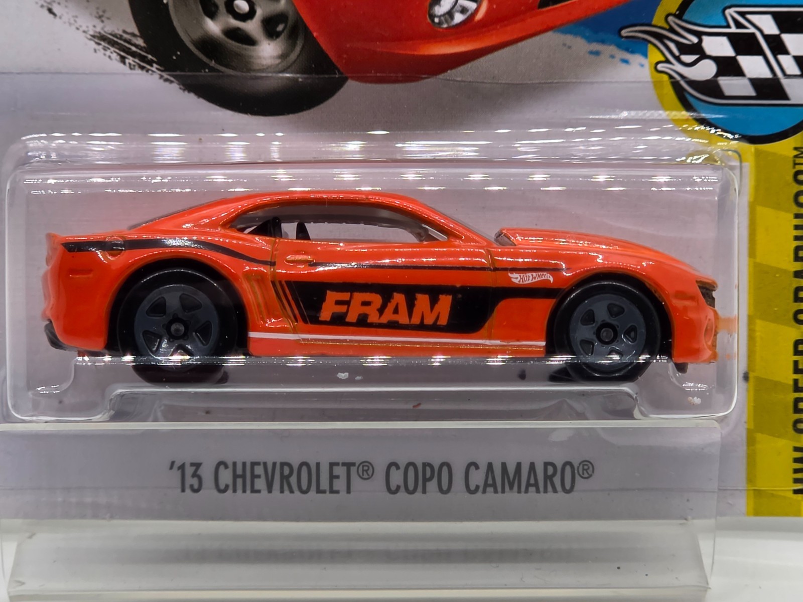 Hot Wheels ’13 Chevrolet COPO Camaro FRAM Orange Speed Graphics 4/10 Sealed