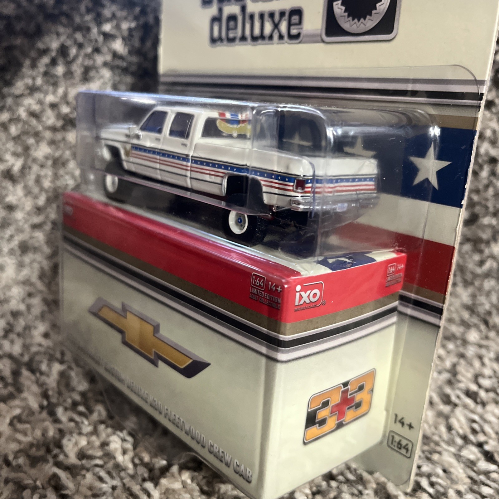 1:64 IXO 1976 Chevrolet Custom Deluxe K30 Fleetside Crew Cab- July 4th Exclusive
