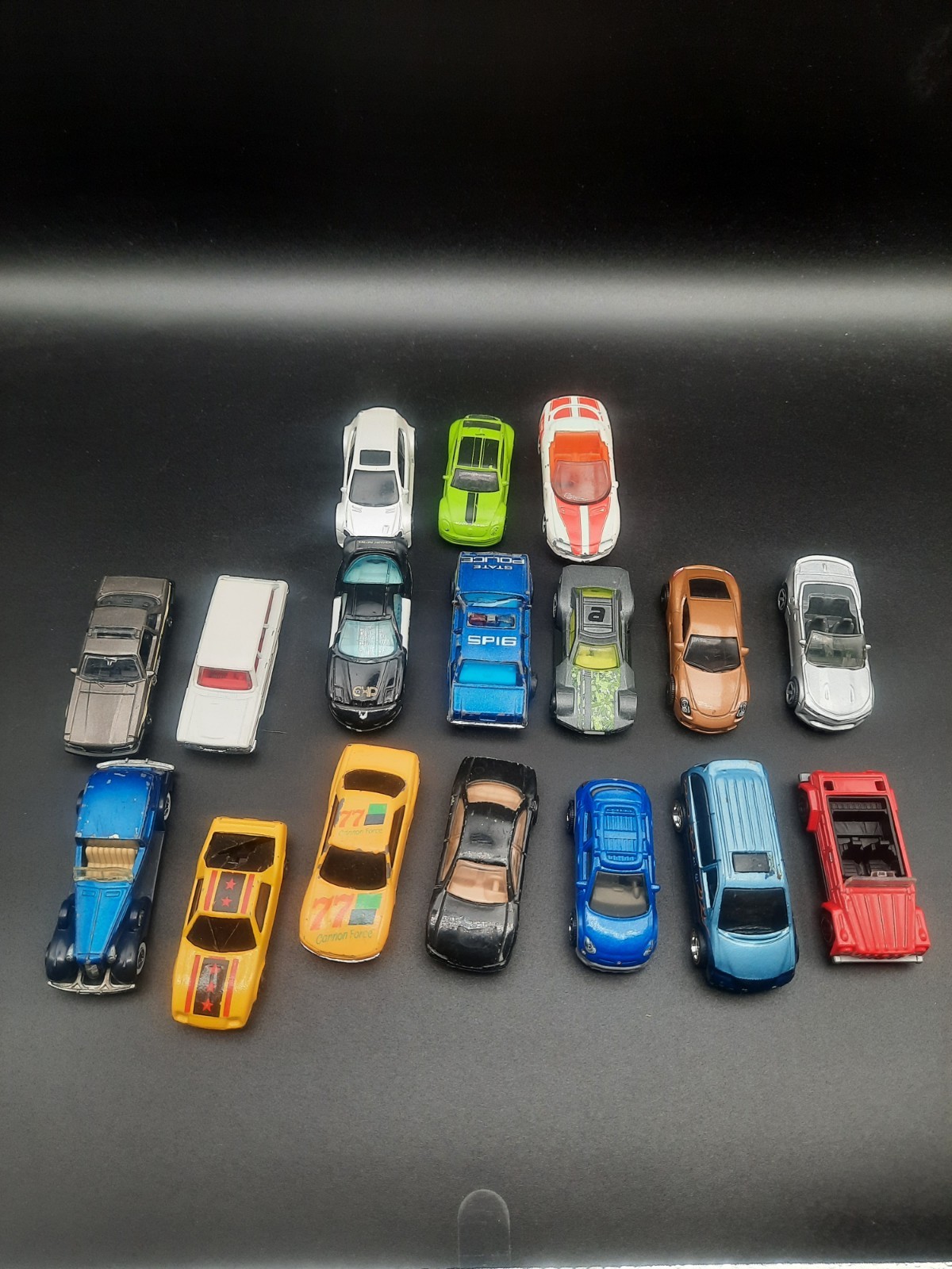 Mixed lot of 17 hot wheels/matchbox cars. Vintage to modern. Most fair shape.