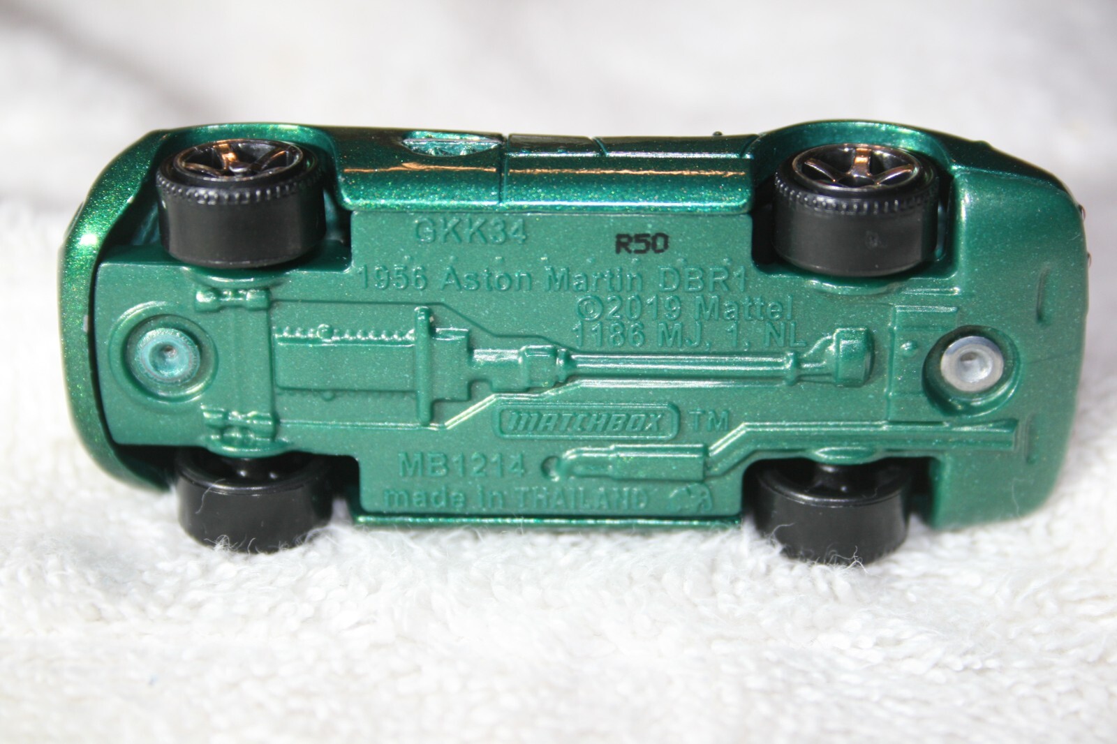 NEW MATCHBOX 1956 DARK GREEN METALLIC ASTON MARTIN DBR1 – 5 SPOKE CHROME WHEELS