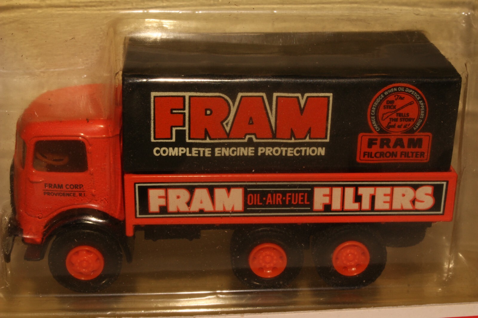 AHL 1950’s Mack CJ Fram Oil Filters Stake Truck, 1:64 Scale