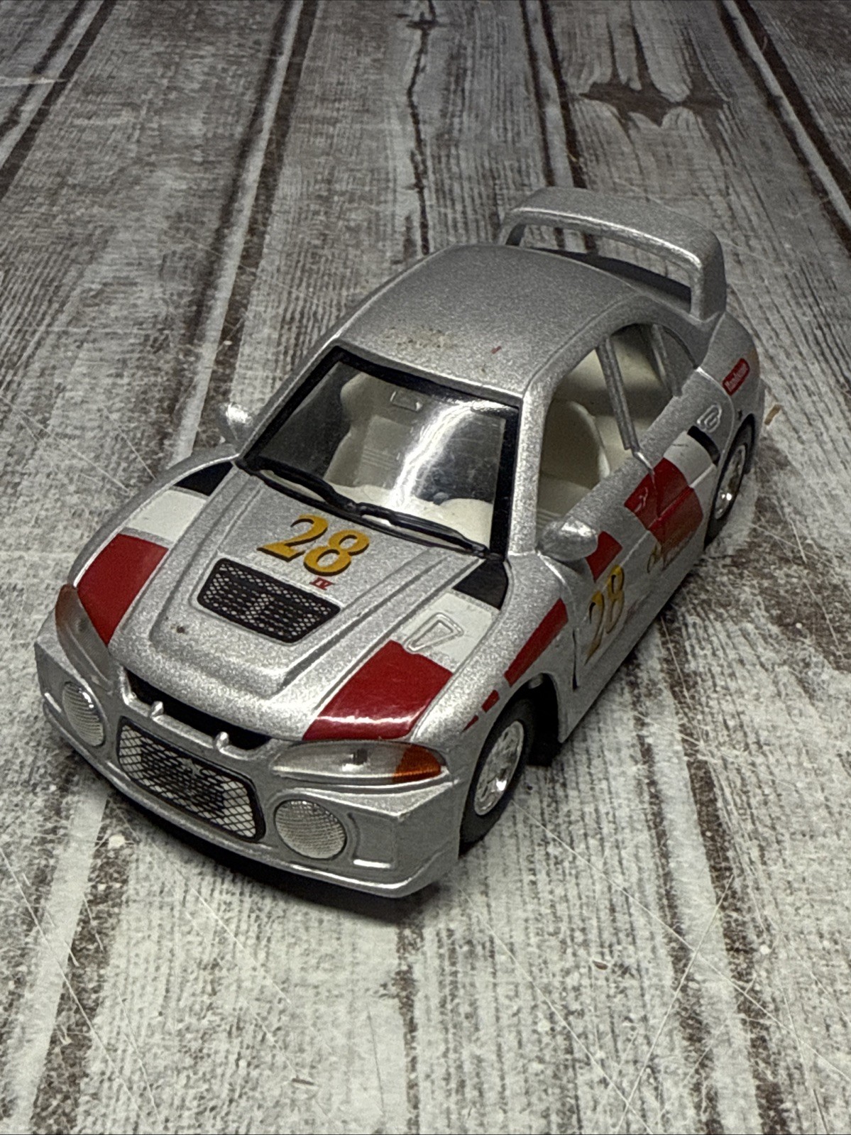Kintoy Racing Silver Mitsubishi Evolution IV Toy Car Pull Back Die Cast 1:41
