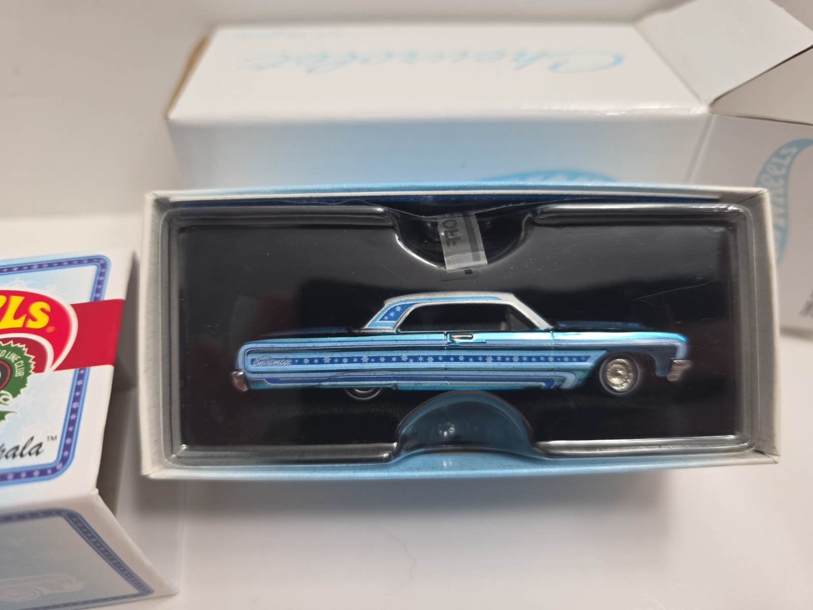 Hot Wheels 2021 RLC Holiday Snowman Chevy ’64 Impala – Spectraflame Light Blue