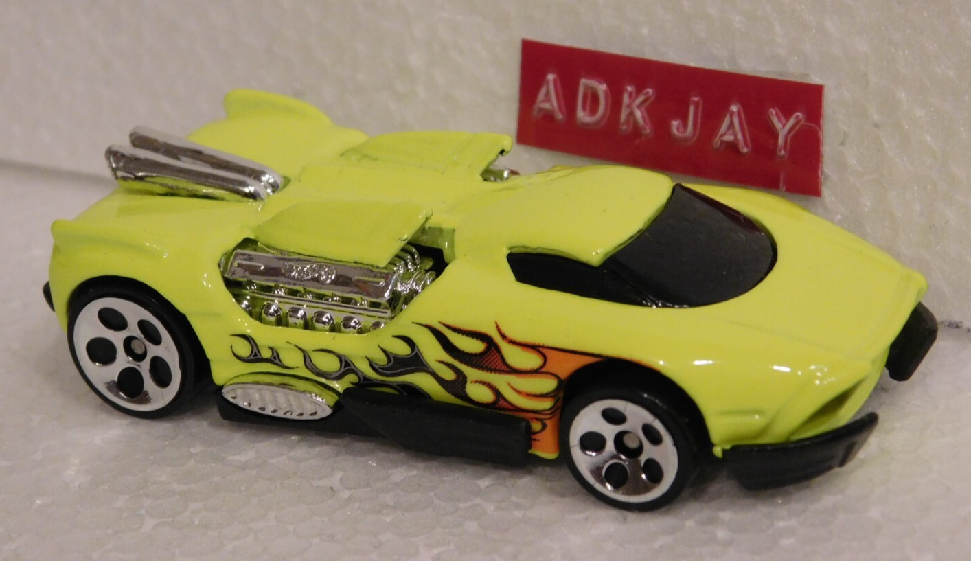 Hot Wheels ~ Maelstorm Neon Yellow Metal Body & Black Base ~ Chrome 5DOT Wheels