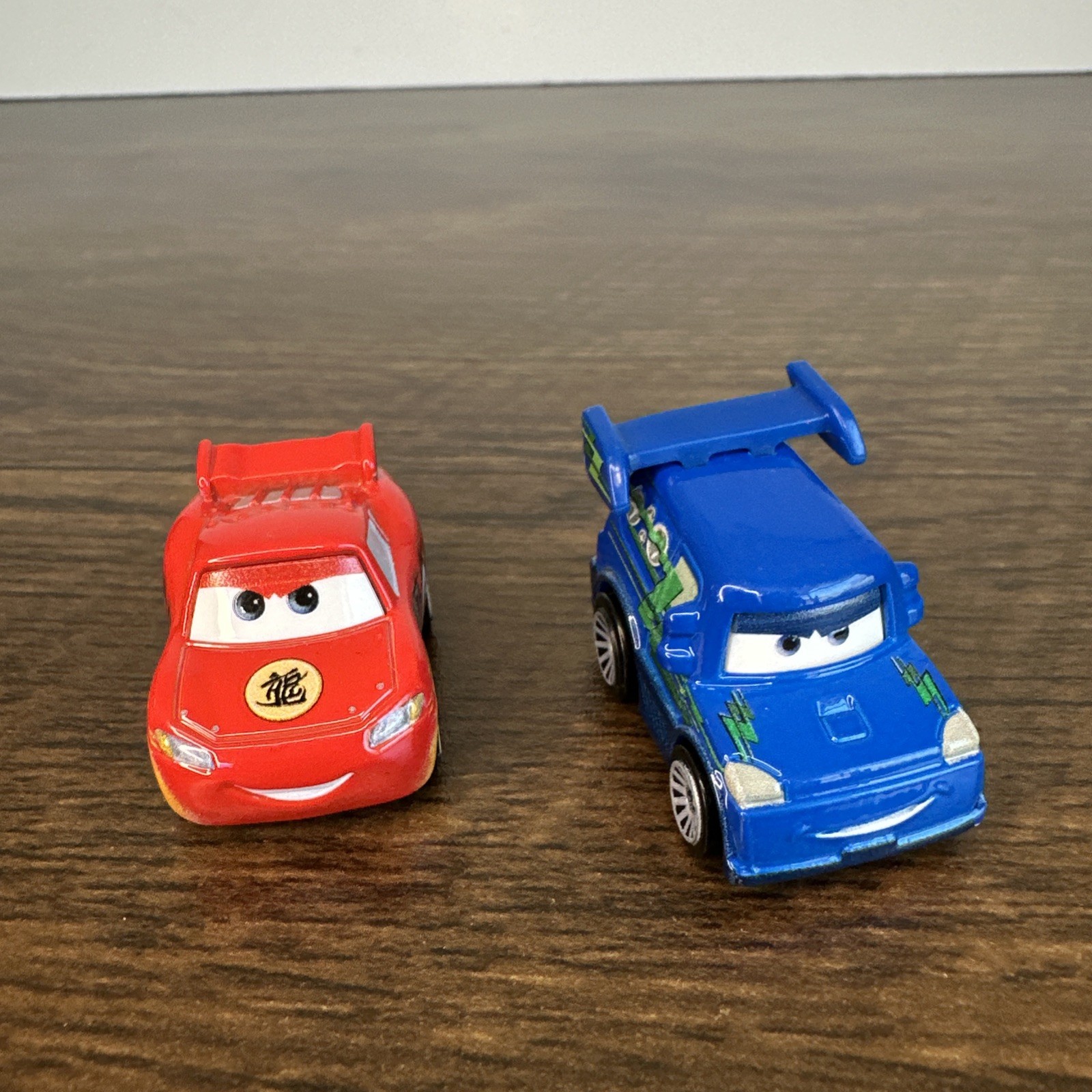 Disney Cars MINI Racers Dragon Lightning McQueen & Race O Rama DJ