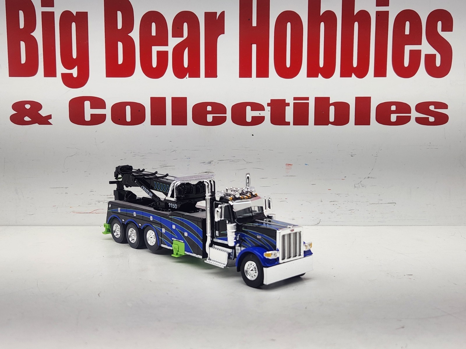 1/64 DCP/FG #60-2248 Black, Blue, & Green 389 DC Peterbilt Century 1150 Rotator