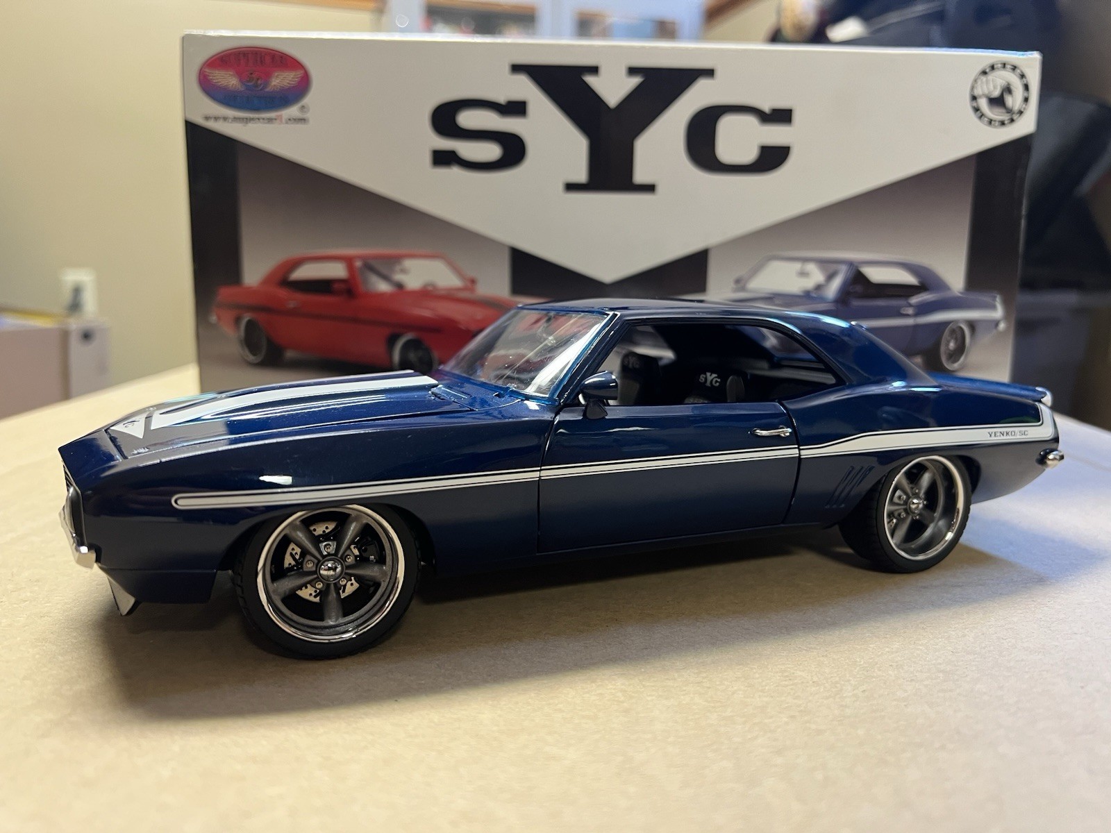 1/18, 1969 CAMARO YENKO/SC STREET FIGHTER IN BLUE, #28 OF 996.