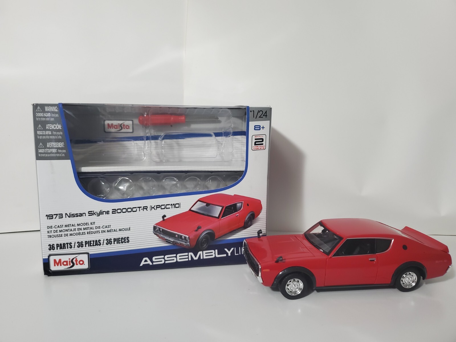 1-24 Maisto Assembly Line Die Cast Metal 73 Nissan Skyline New Build Super Nice