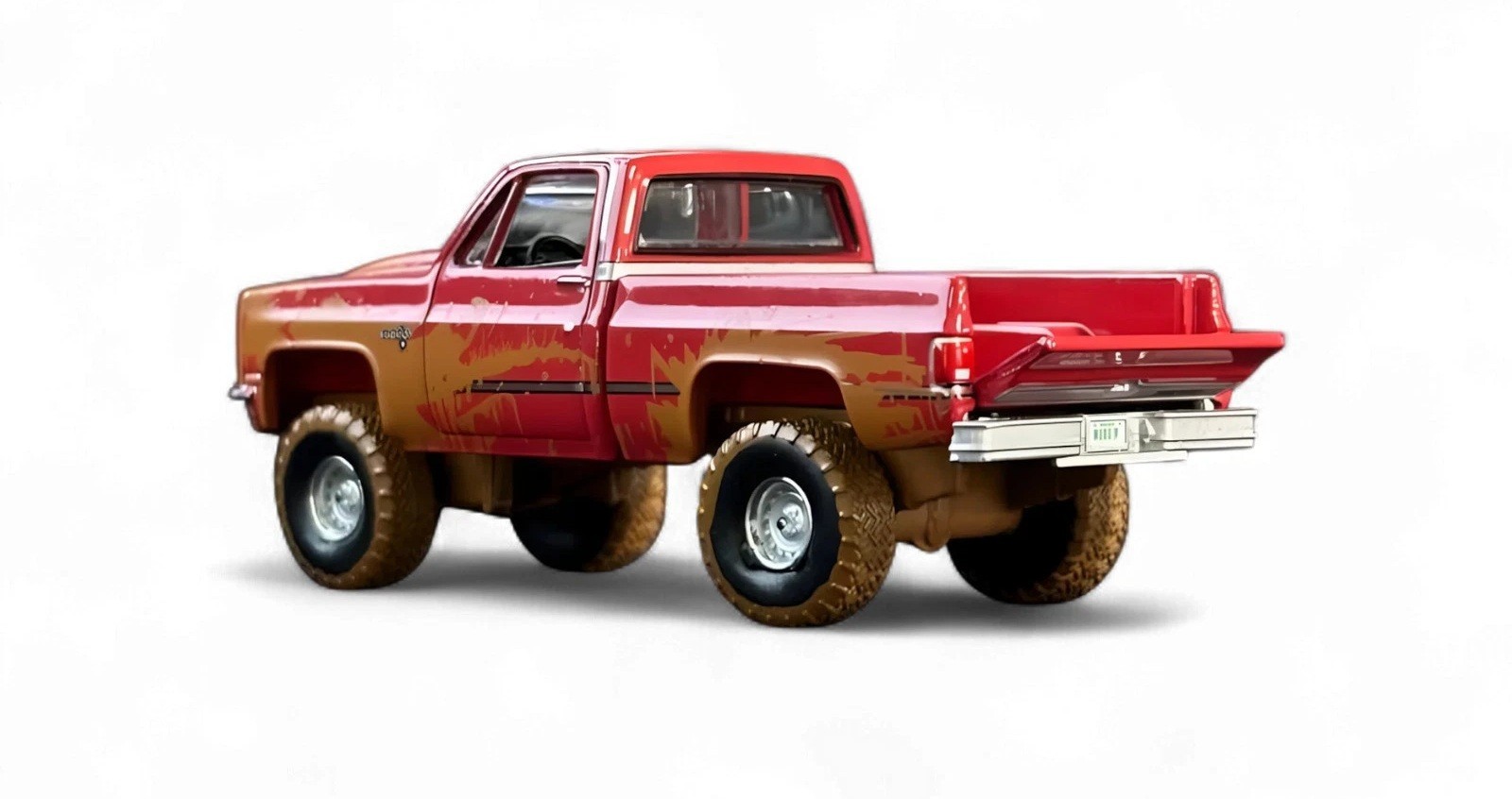 Auto World 1:64 2022 Muddin’ USA R1: Lifted Muddy 1983 CHEVROLET SILVERADO K10