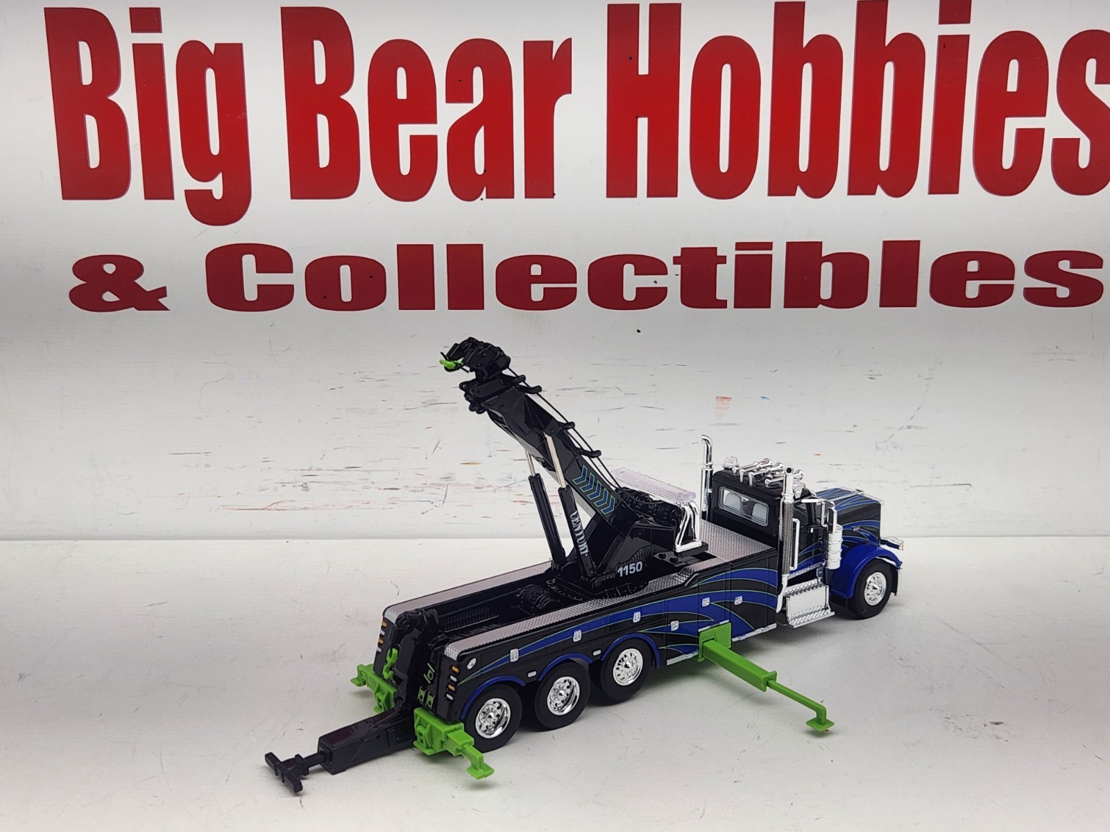 1/64 DCP/FG #60-2248 Black, Blue, & Green 389 DC Peterbilt Century 1150 Rotator