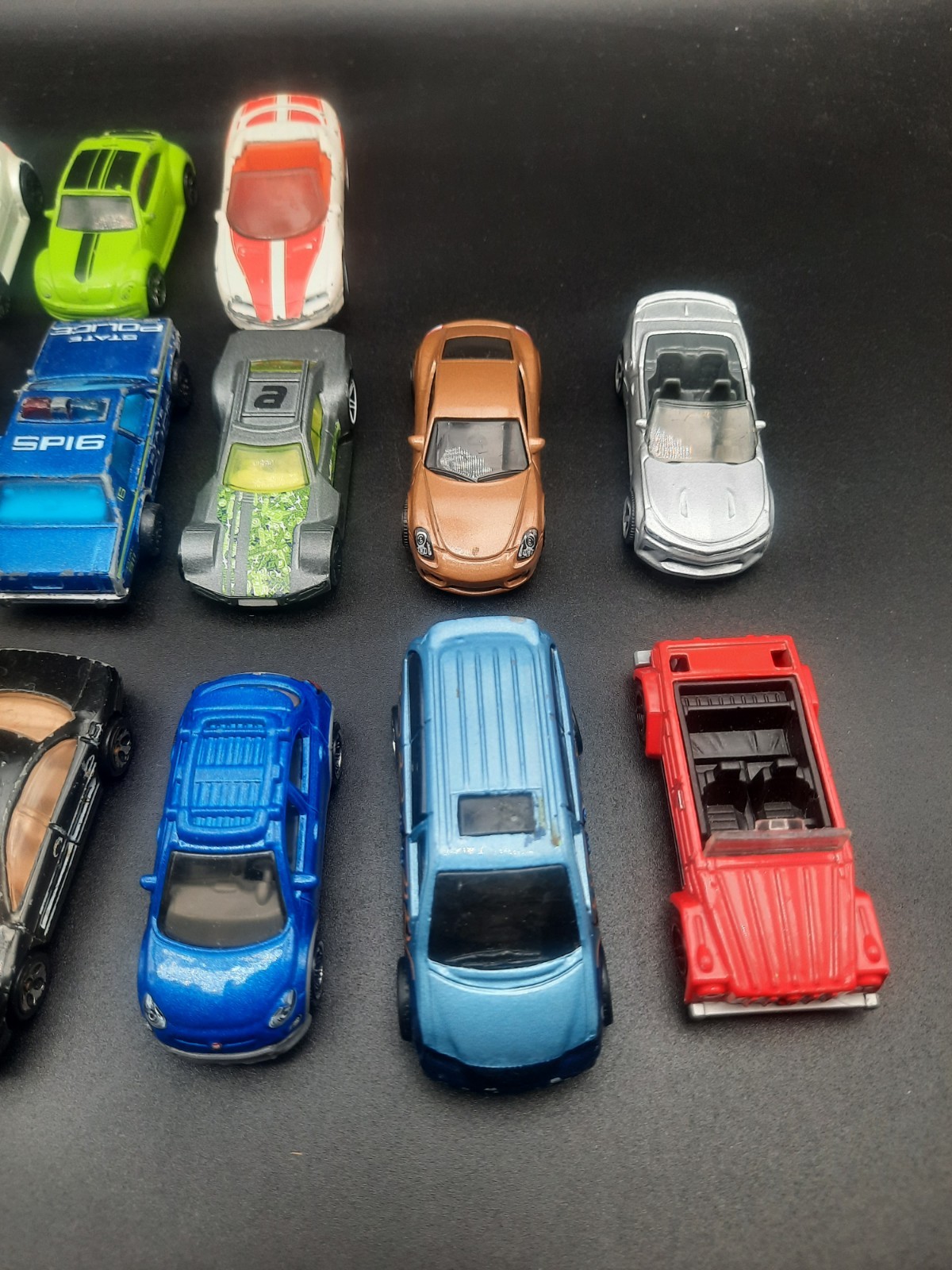 Mixed lot of 17 hot wheels/matchbox cars. Vintage to modern. Most fair shape.