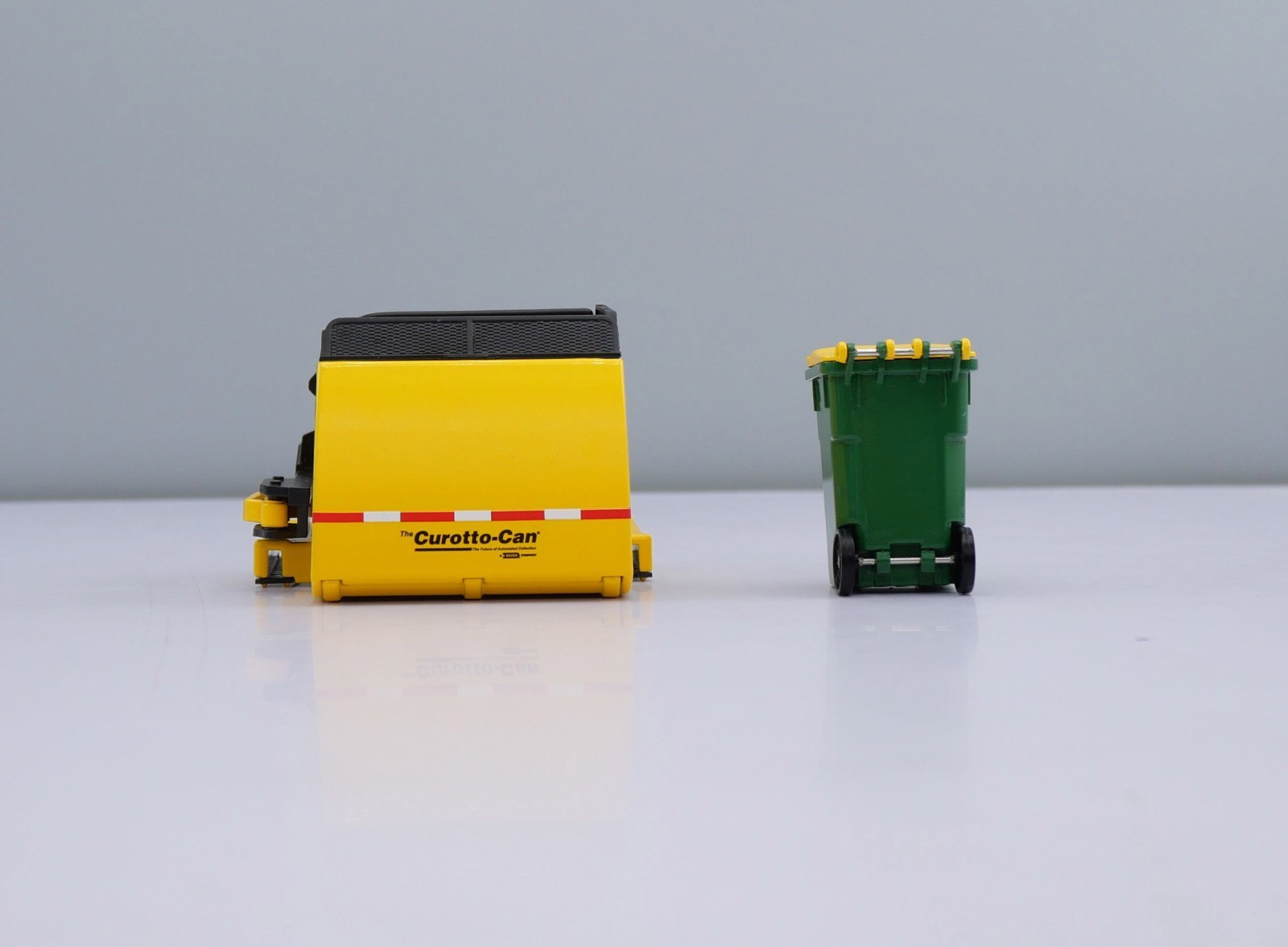 First Gear Heil Frontload Diecast 34th Scale Yellow Curotto Can