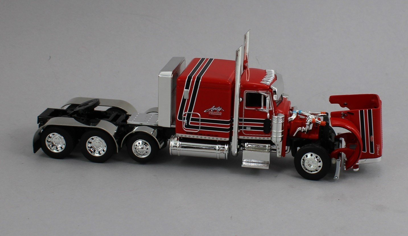 DCP 1:64 *ANTY TRUCKING* Peterbilt 379 63″ Flattop w/Tri-Axle LOWBOY Trailer NIB